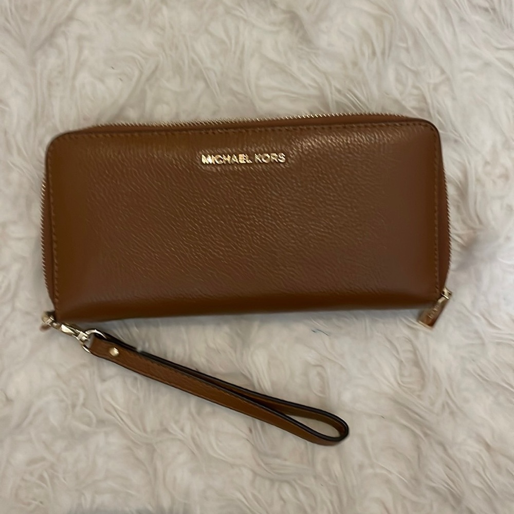 Michael Kors tan wallet.